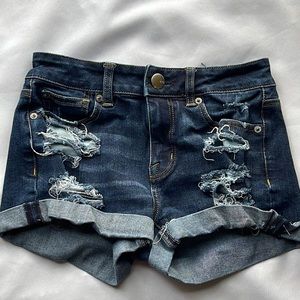 American Eagle Outfitters ripped style blue jean shorts.  Young ladies size 0.